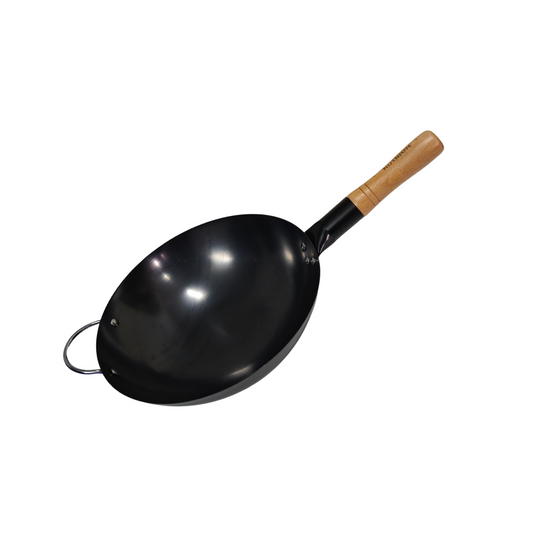 A large carbon steel wok with a wooden handle.
