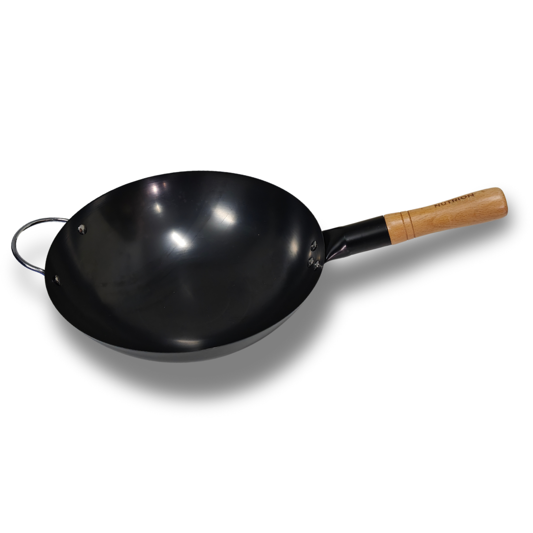 A large carbon steel wok with a wooden handle.